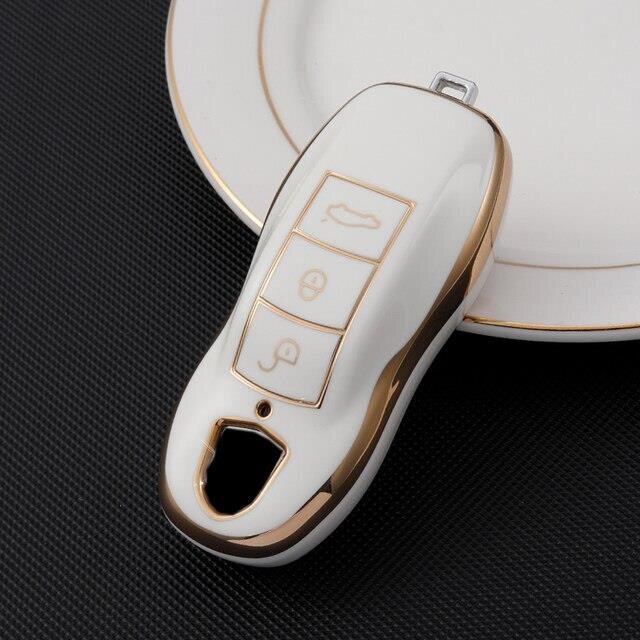 https://www.keyscover.de/media/image/product/180/md/porsche-schluesselhuelle-passend-porsche-cayenne-panamera-macan-911-922-carrera-taycan-fernbedienung-tpu-schluesselcover-schluesselhuelle-schluesselanhaenger-schluessel-etui-weiss.jpg